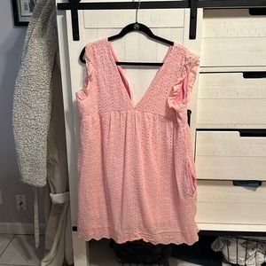 Pink mini dress with shorts and pockets